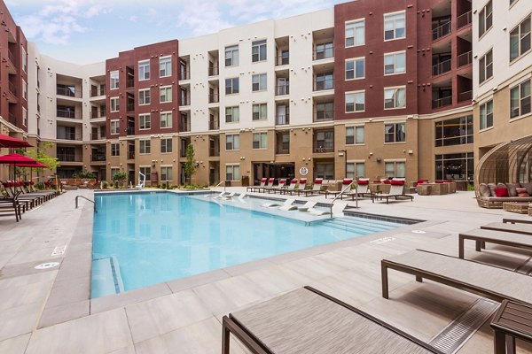 Stunning outdoor pool with mountain views at Luxe at Mile High luxury apartments