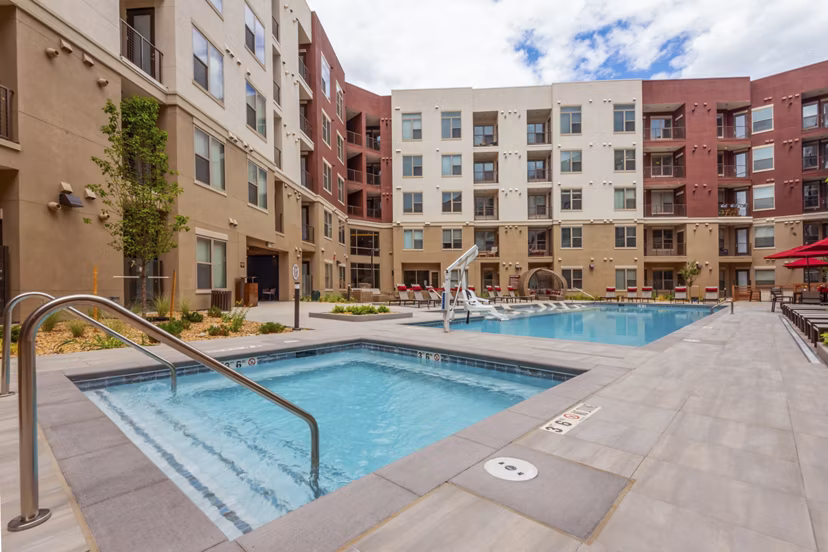 Luxury outdoor swimming pool at Luxe at Mile High apartments, ideal for relaxation and leisure, in the heart of Denver