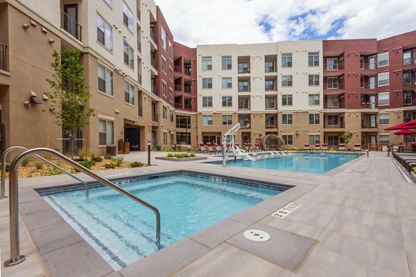 Luxury outdoor swimming pool at Luxe at Mile High apartments, ideal for relaxation and leisure, in the heart of Denver