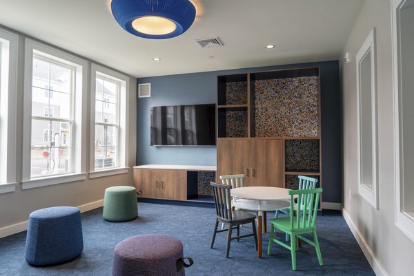 Elegant clubhouse with modern decor at The Madison at Marshfield luxury apartments