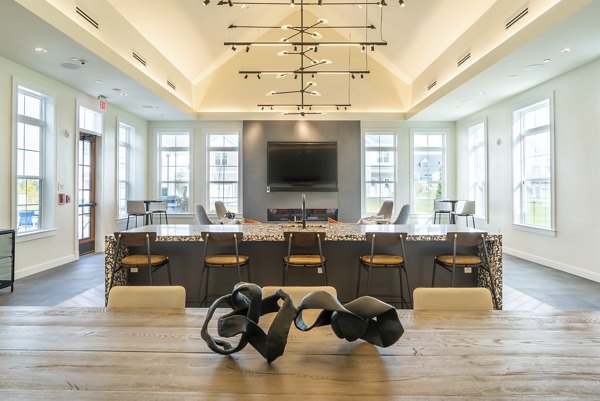 Stylish clubhouse at The Madison at Marshfield featuring cozy seating areas and modern decor