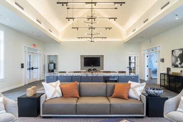 Clubhouse featuring modern design and comfortable seating at The Madison at Marshfield luxury apartments