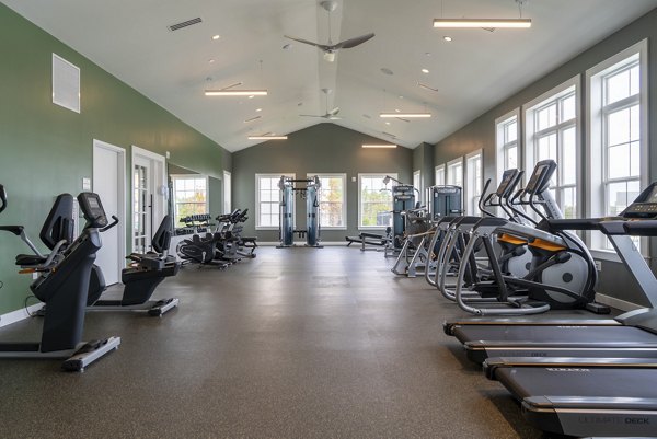 State-of-the-art fitness center featuring modern equipment at The Madison at Marshfield luxury apartments