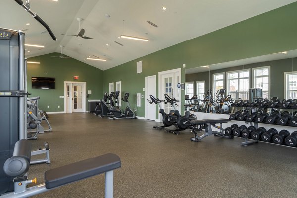 State-of-the-art fitness center featuring modern equipment at The Madison at Marshfield luxury apartments