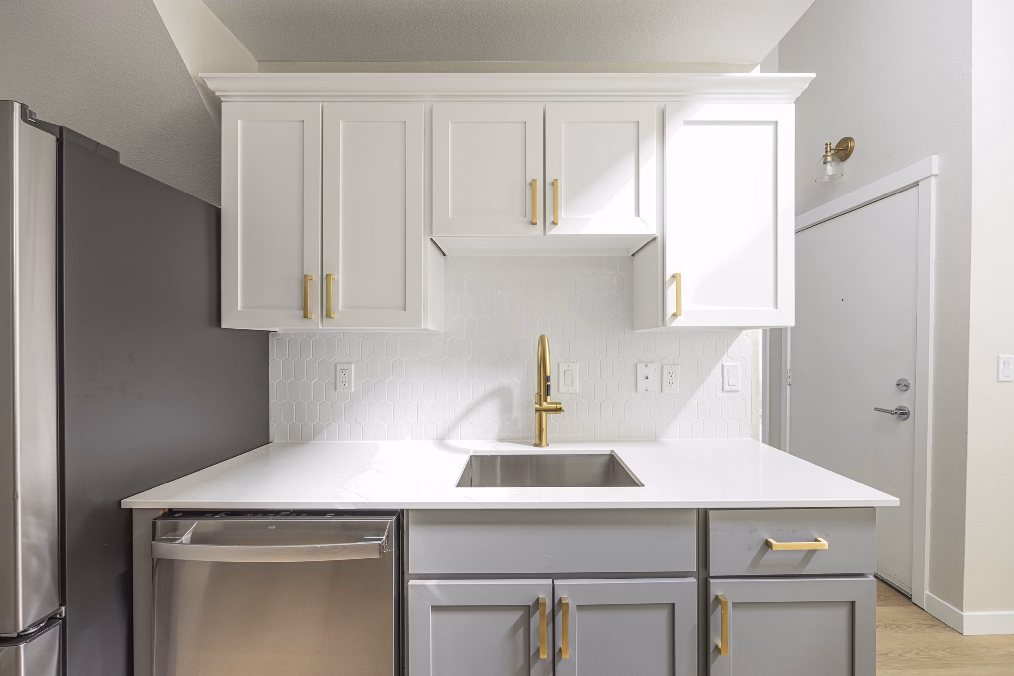 Stylish kitchen with modern appliances in One Jefferson Apartments