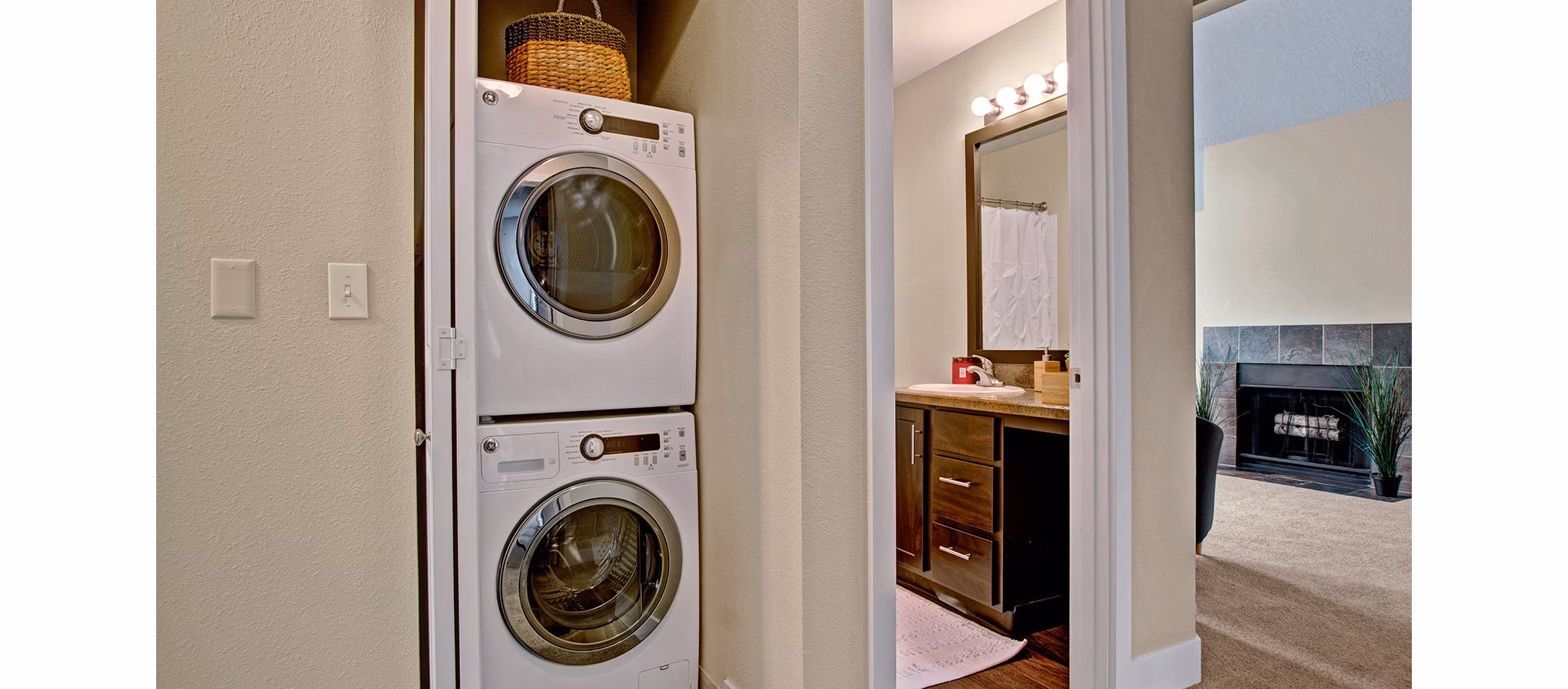 Laundry room featuring modern appliances at One Jefferson Apartments