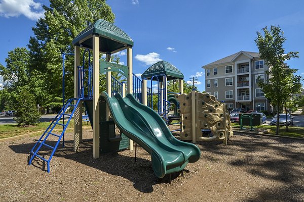 Orchard Park Apartments: Elegant mid-rise building in serene garden setting