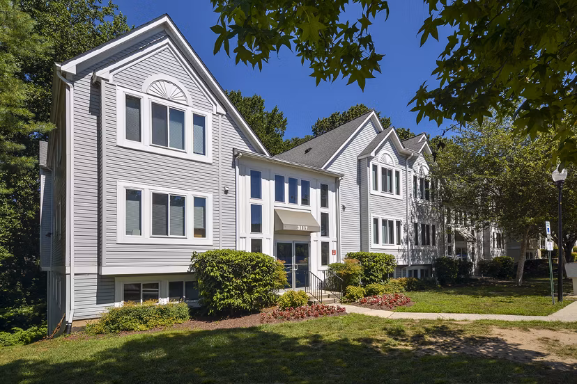 Orchard Park: Elegant facade of luxury apartments in a serene suburban setting
