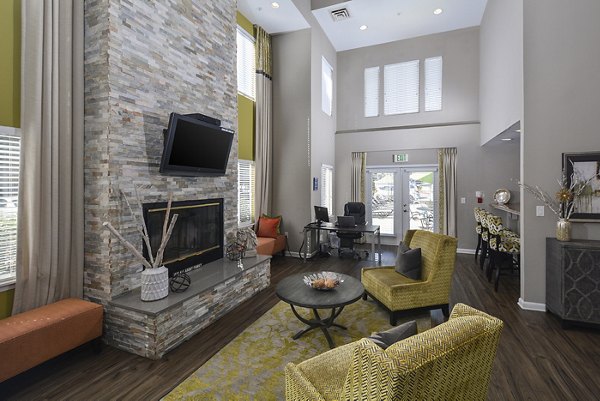Spacious living room with modern furnishings at Orchard Park Apartments