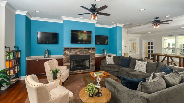 Clubhouse with modern decor and seating at The Park at Walnut Ridge Apartments