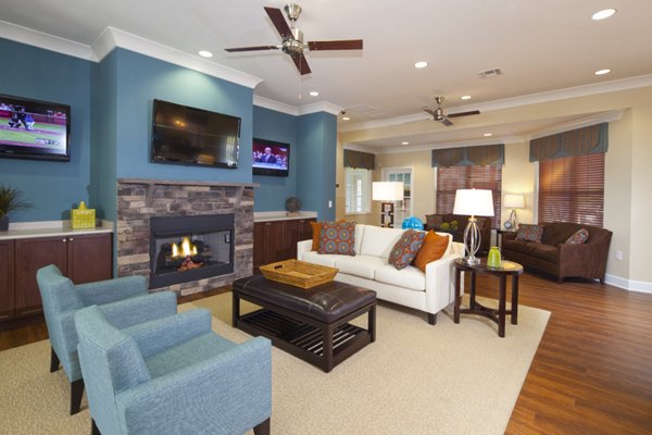 Clubhouse featuring modern design and comfortable seating at The Park at Walnut Ridge Apartments