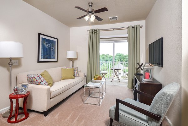 Clubhouse with modern design and comfortable seating at The Park at Walnut Ridge Apartments