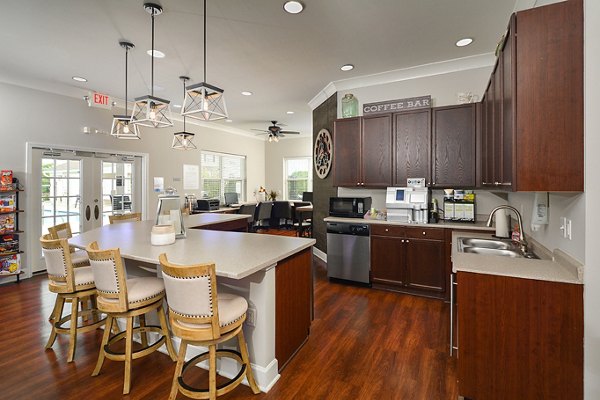 Kitchen featuring modern appliances and sleek cabinetry in The Park at Walnut Ridge Apartments