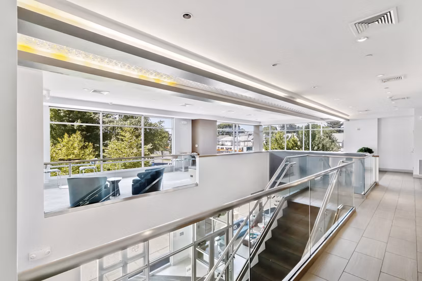 Game room with pool table and modern decor at Re150 Apartments