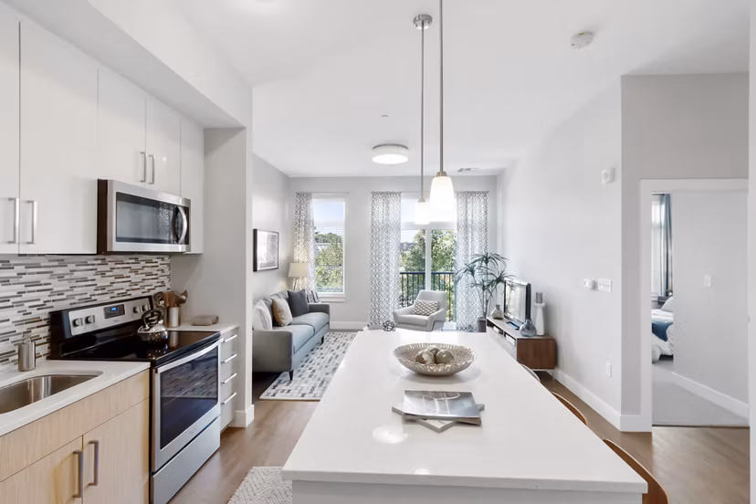 Modern kitchen with stainless steel appliances at Re150 Apartments, a luxury community in the heart of Greystar's offerings