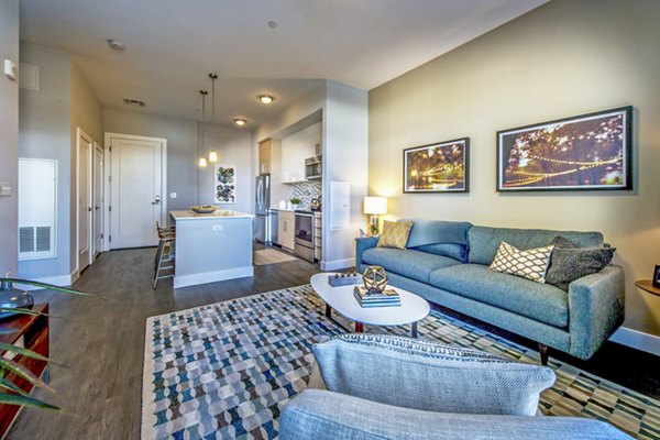 Stylish living room with modern decor in Re150 Apartments