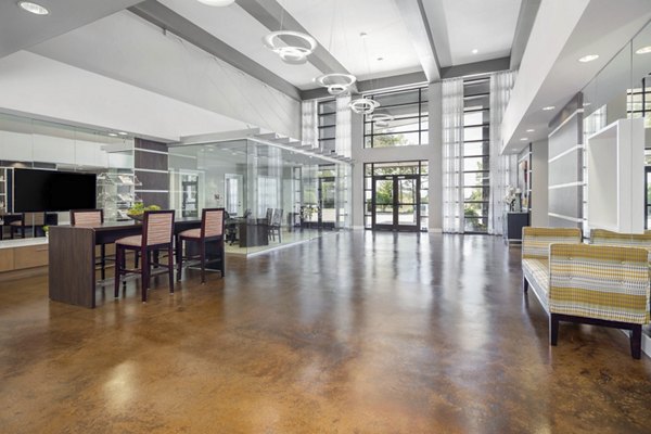 Solara Apartments: Modern living room with stylish decor and natural light