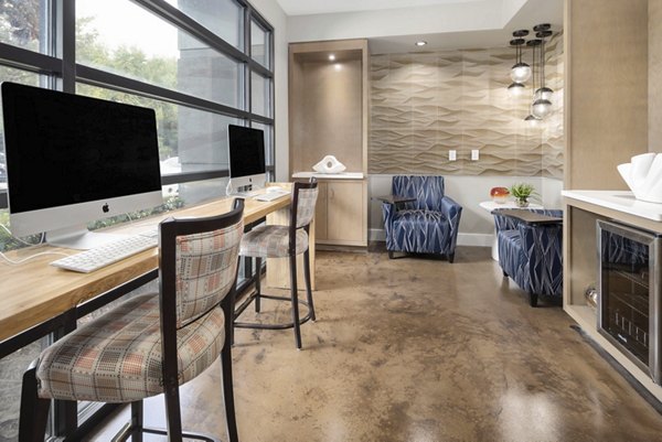 Living room at Solara Apartments: Bright, open space featuring modern decor and large windows for natural light in luxury apartments