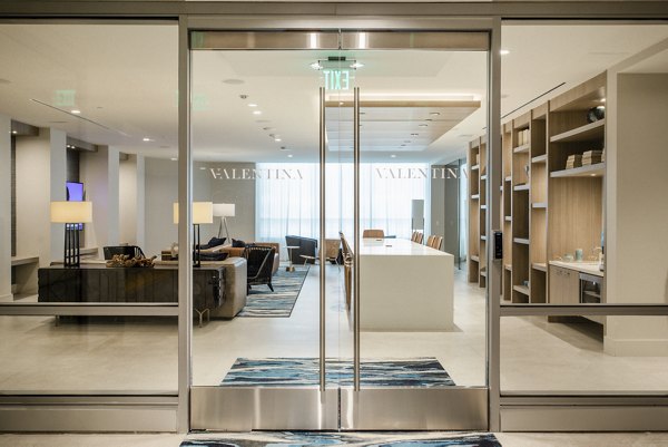 Cozy clubhouse with modern dÃ©cor at Valentina by Alta Apartments, ideal for social gatherings and relaxation