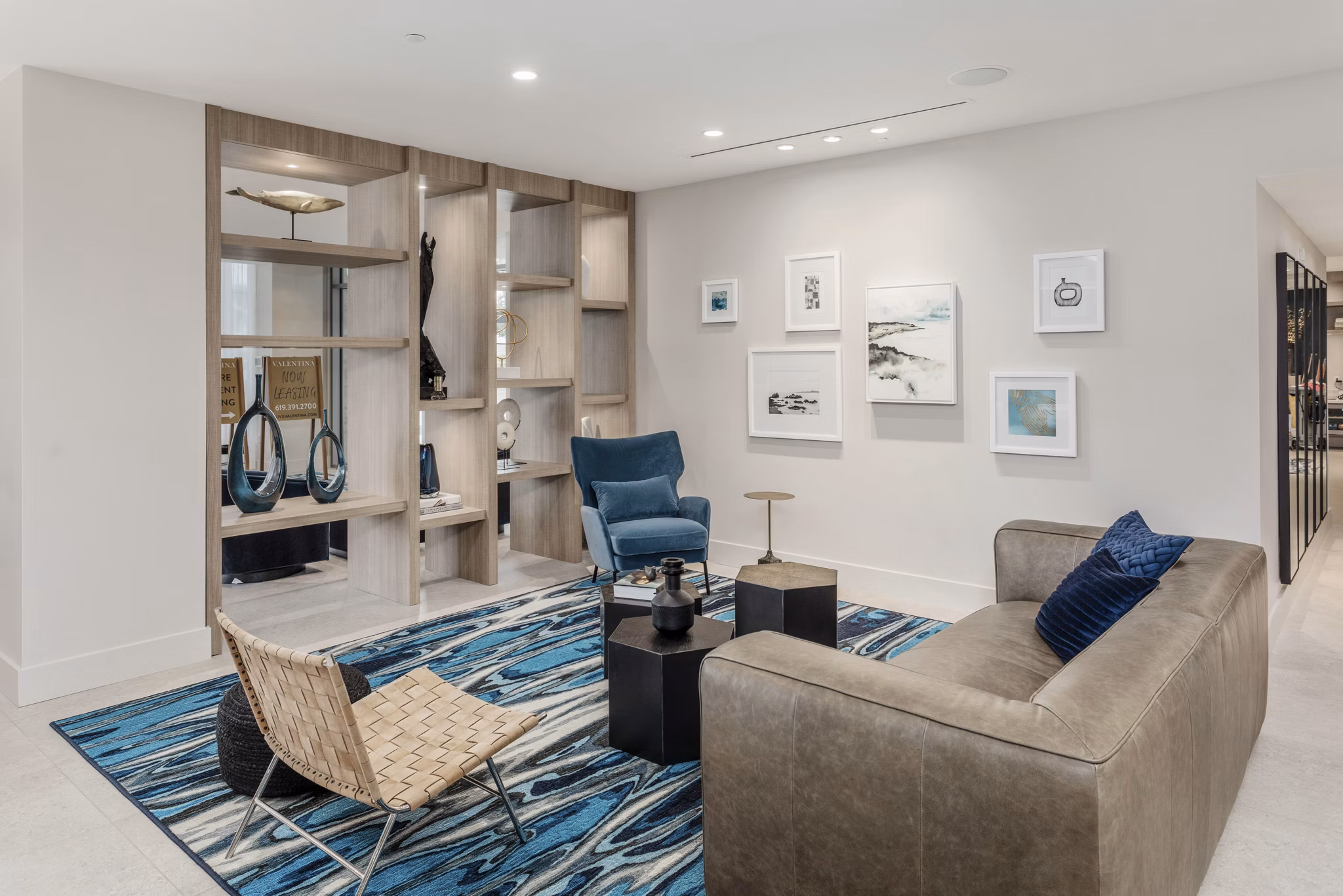 Valentina by Alta Apartments: Modern clubhouse with elegant decor and seating area in luxury apartment community