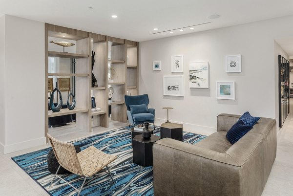 Valentina by Alta Apartments: Modern clubhouse with elegant decor and seating area in luxury apartment community