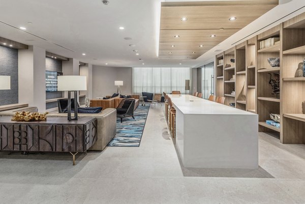 Clubhouse with modern decor and lounge seating at Valentina by Alta Apartments