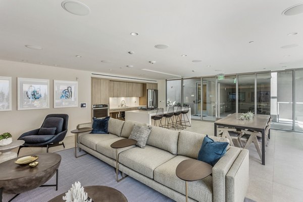 Modern clubhouse with elegant furnishings at Valentina by Alta Apartments, perfect for social gatherings and resident events