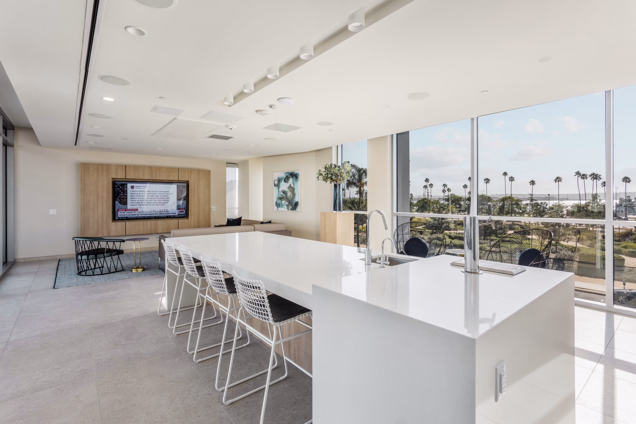 Clubhouse featuring contemporary design and communal seating at Valentina by Alta Apartments