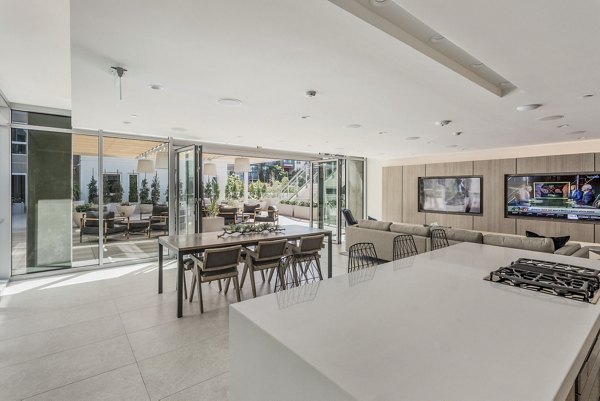 Clubhouse featuring modern seating and entertainment area at Valentina by Alta Apartments