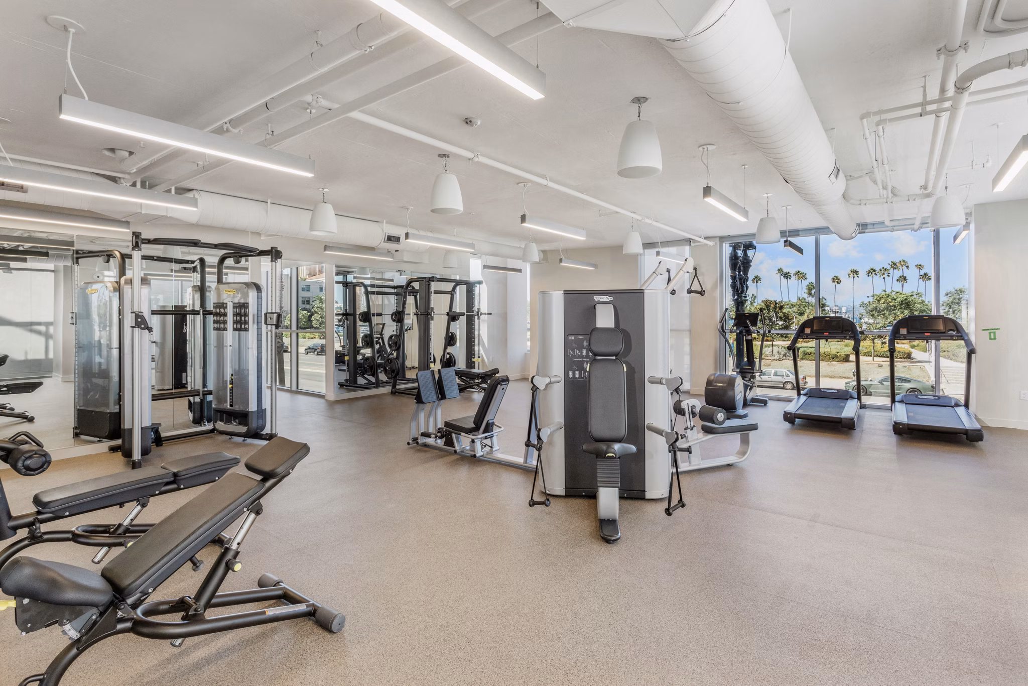 State-of-the-art fitness center with modern equipment at Valentina by Alta Apartments