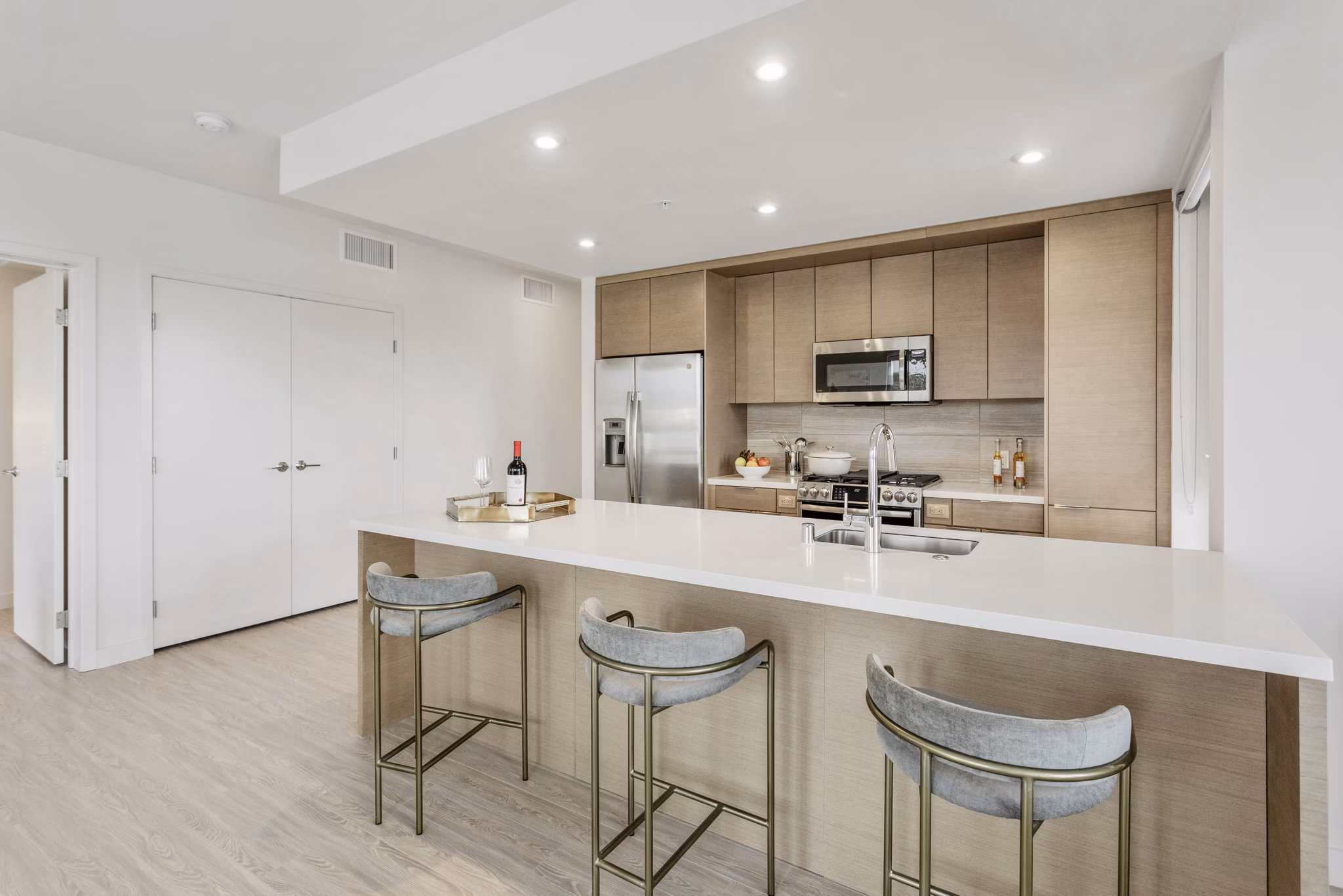 Modern kitchen with stainless steel appliances at Valentina by Alta Apartments