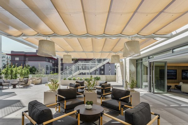 Spacious patio with modern seating at Valentina by Alta Apartments