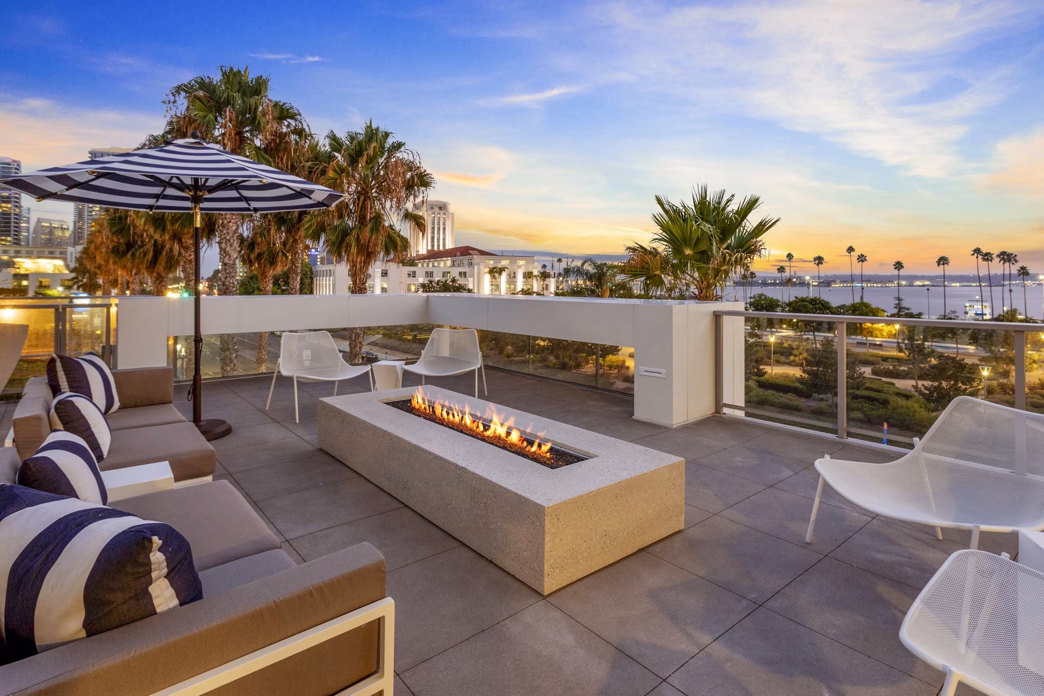 Spacious patio with ocean views at Valentina by Alta Apartments, offering a luxury outdoor experience