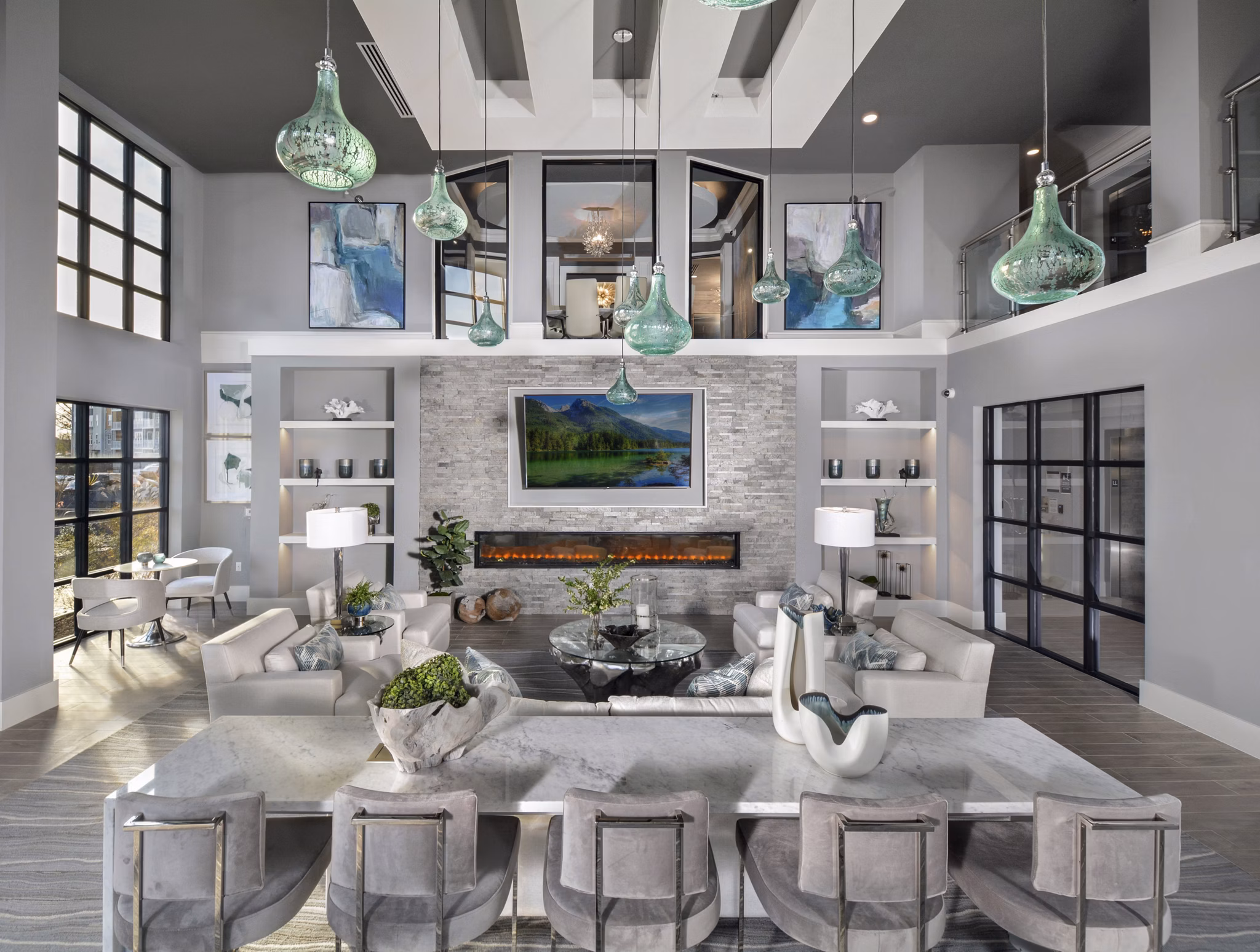 Contemporary clubhouse with comfortable seating and modern decor at The Wexley at 100 Apartments