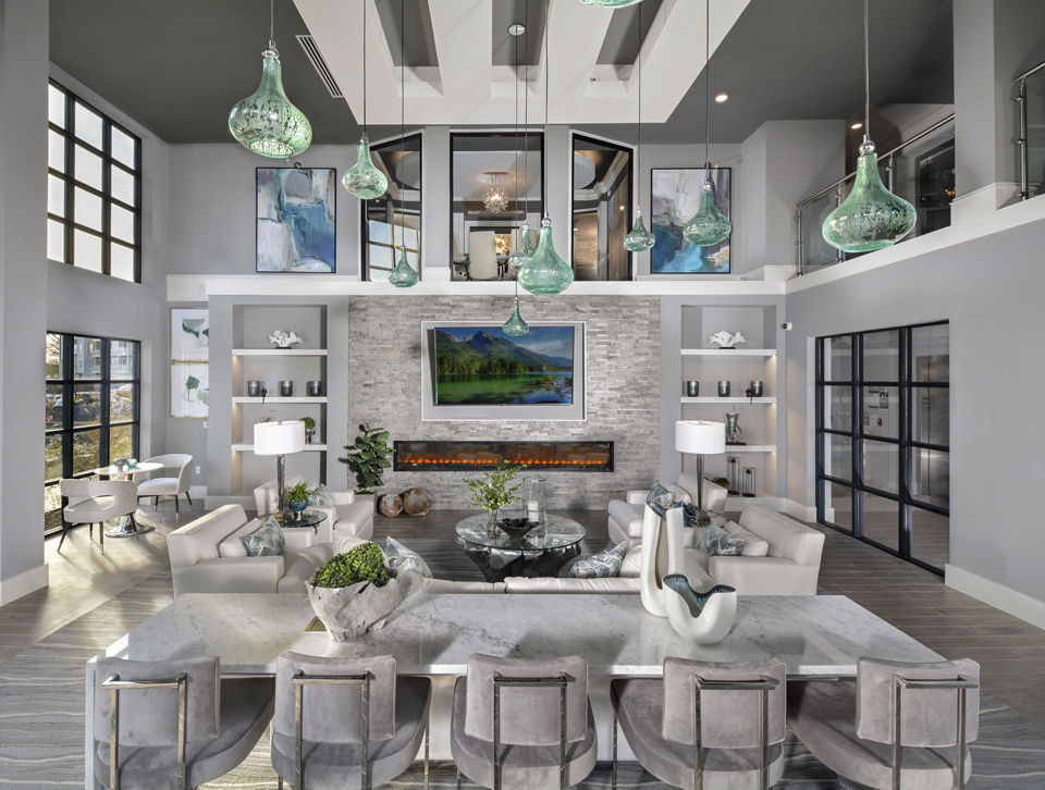 Contemporary clubhouse with comfortable seating and modern decor at The Wexley at 100 Apartments