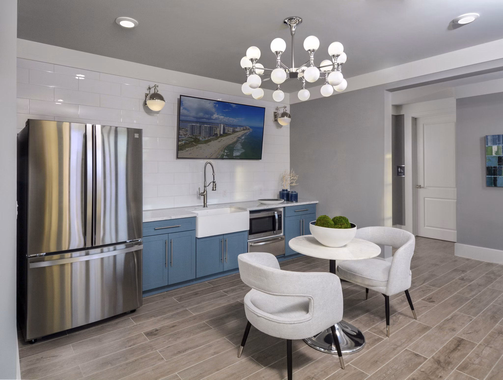 Modern clubhouse with stylish seating areas at The Wexley at 100 Apartments
