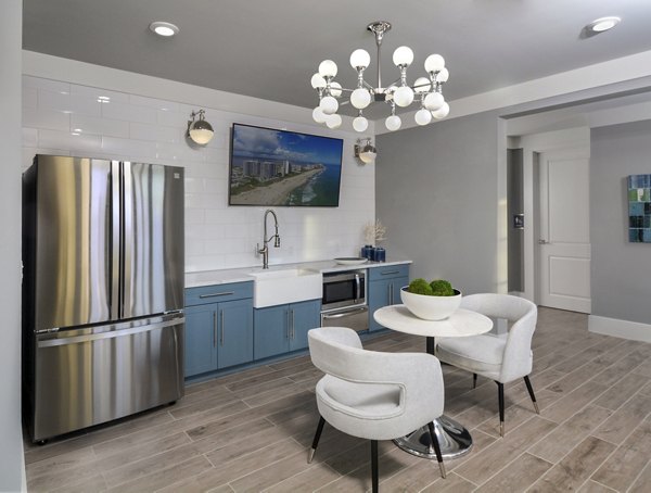 Modern clubhouse with stylish seating areas at The Wexley at 100 Apartments