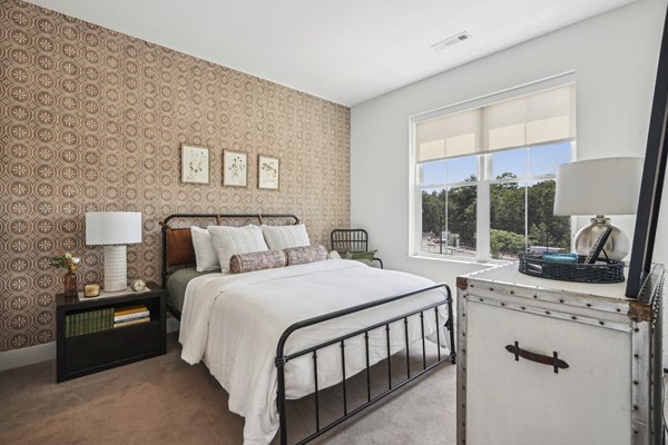 bedroom at The Lodge Apartments