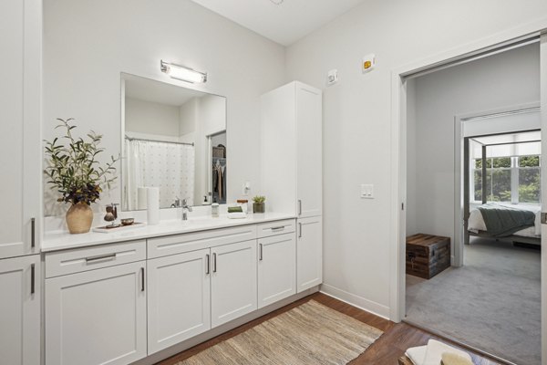 Luxurious bathroom with modern fixtures in The Lodge Apartments