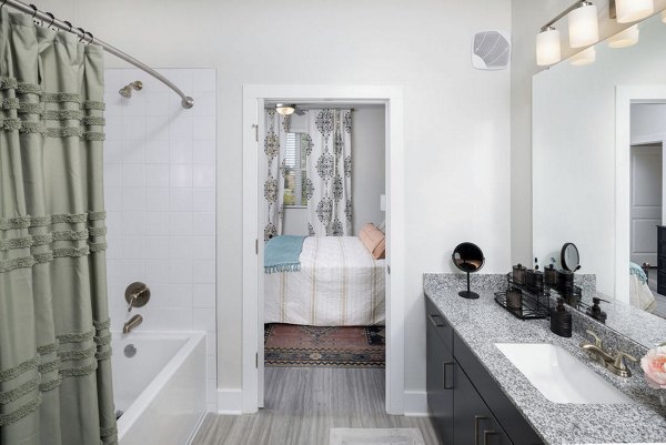 Modern bathroom with elegant fixtures at The Clara by Broadstone Apartments, featuring a sleek design in a luxury residential setting