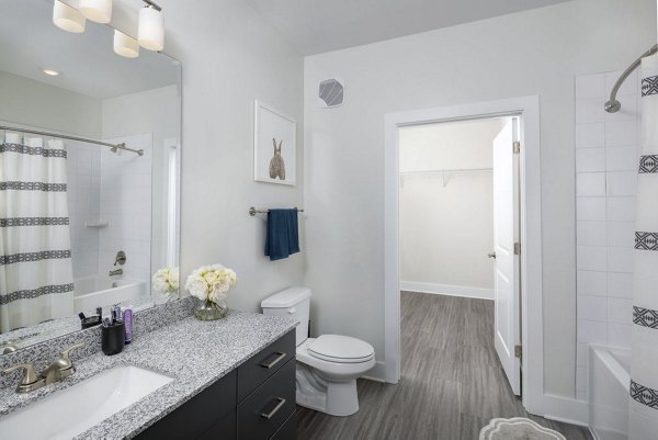 Modern bathroom with sleek fixtures at The Clara by Broadstone Apartments, featuring luxurious finishes and contemporary design