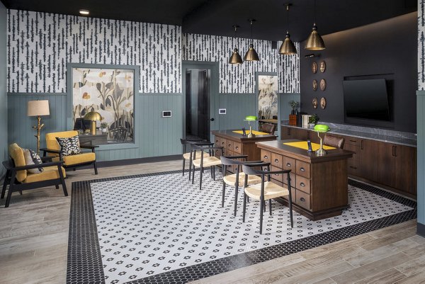 Stylish clubhouse featuring modern seating and decor at The Clara by Broadstone Apartments