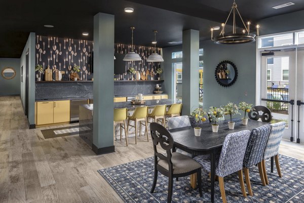 Clubhouse featuring modern seating and spacious layout at The Clara by Broadstone Apartments