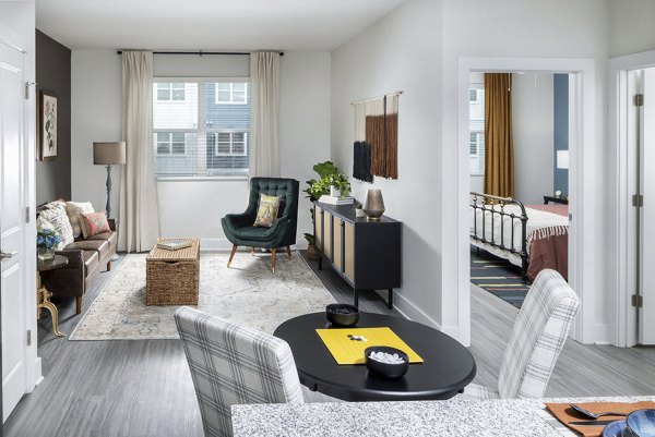 Spacious dining area with modern furnishings in The Clara by Broadstone Apartments Perfect for hosting meals and gatherings