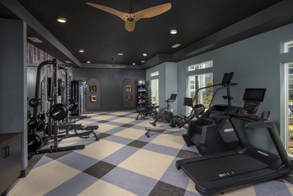 Modern fitness center with state-of-the-art equipment at The Clara by Broadstone Apartments, offering luxury amenities for active lifestyles
