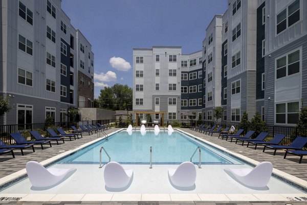 Rooftop swimming pool with city views at The Clara by Broadstone Apartments