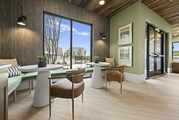 Modern clubhouse with sleek furnishings at Flats at General Time Apartments