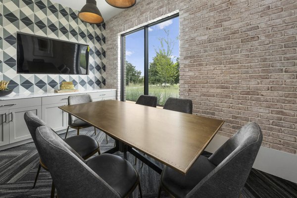 Modern meeting facility with state-of-the-art equipment at Flats at General Time Apartments