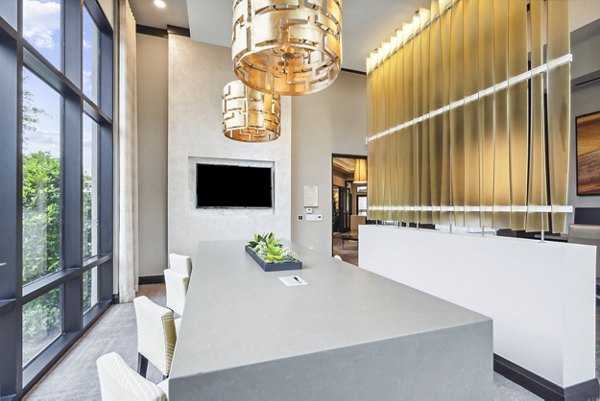 Modern clubhouse at Domain at Midtown Park Apartments featuring luxurious seating areas and elegant design for premium gatherings and social events