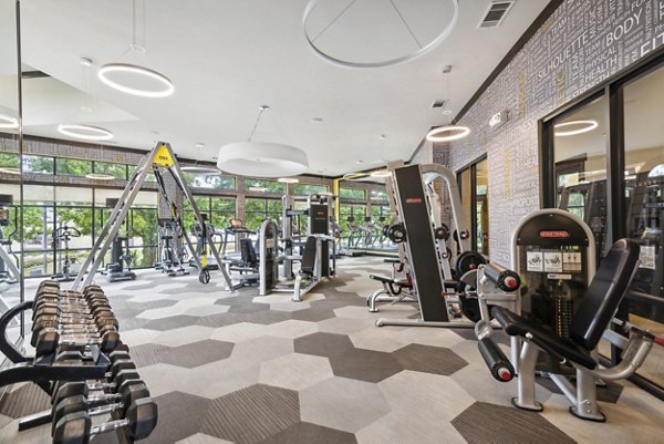 Fitness center with modern equipment at Domain at Midtown Park Apartments